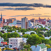 Portland, Maine, USA downtown city skyline at dusk.