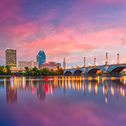 Springfield, Massachusetts, USA downtown skyline on the river at dusk.