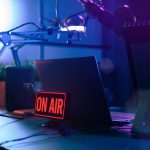 Live online radio broadcasting station desk with on air sign